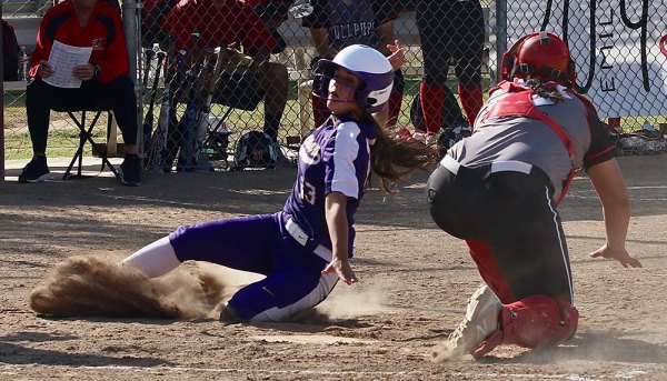 Lemoore's Madison Martinez scores first in loss to Hanford Wednesday afternoon that ended Tigers' winning streak.